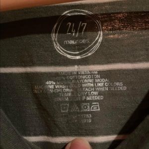 Maurice‘s striped green shirt